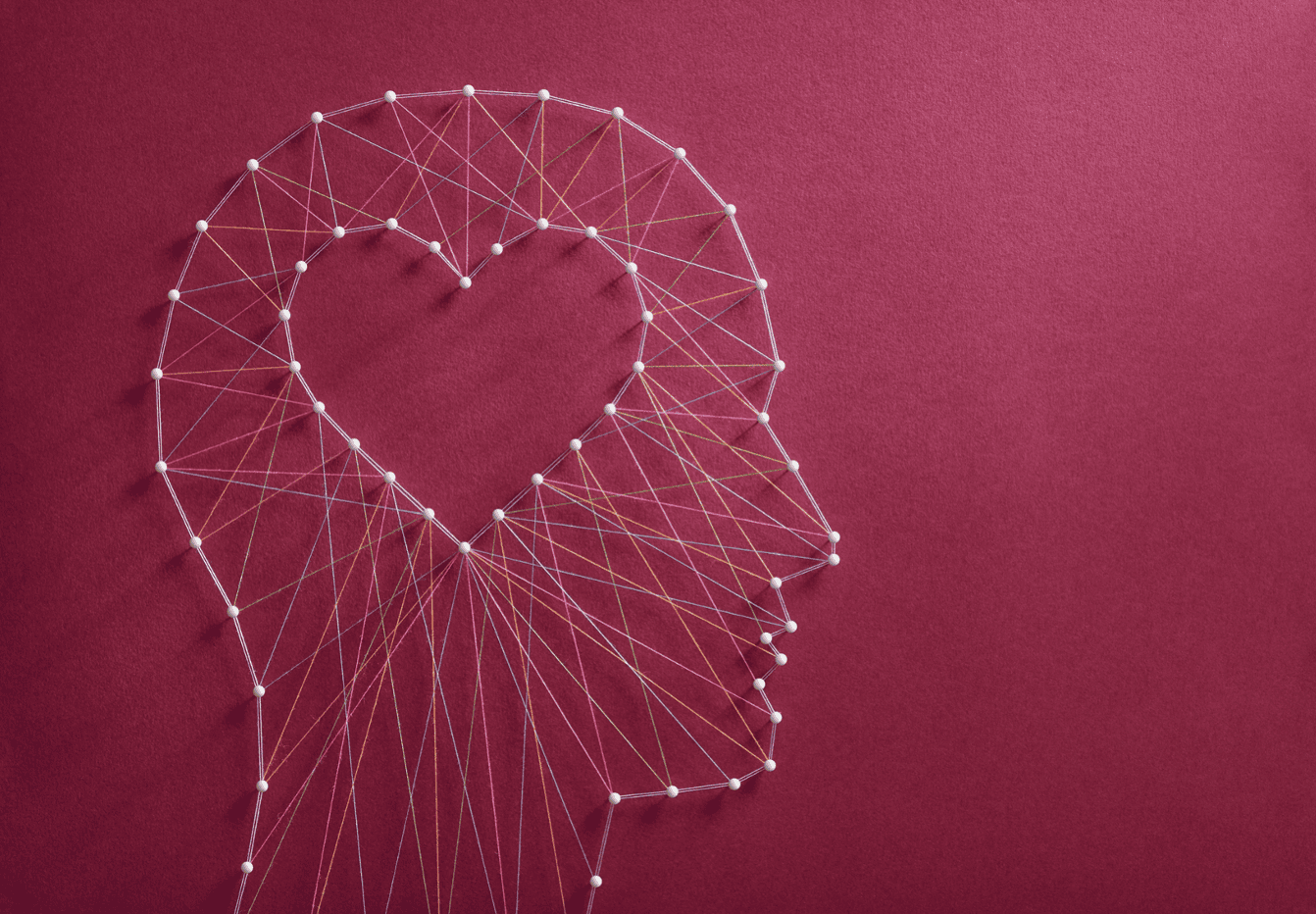 Mental Health in Recovery an artistic rendition of a head with the brain as a heart